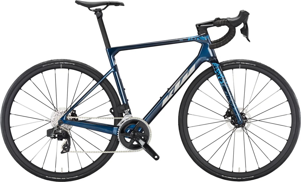 KTM Revelator Alto Elite AXS — transparent blue (chrome+blue), maat L / 57 cm